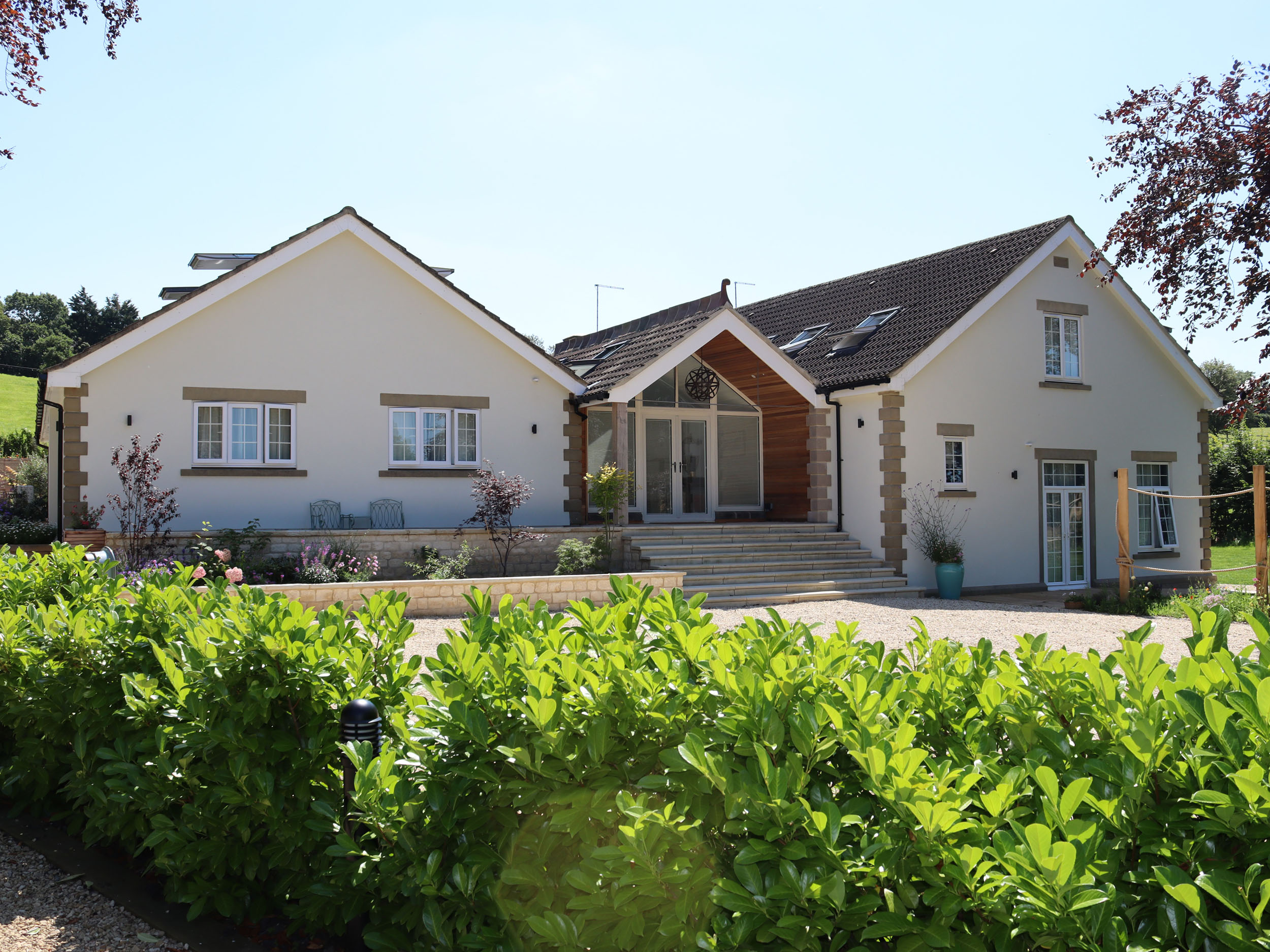 Leafield House in Upper Seagry, Wiltshire. Hot tub. Cinema room. Library. Freestanding bath. Luxury.