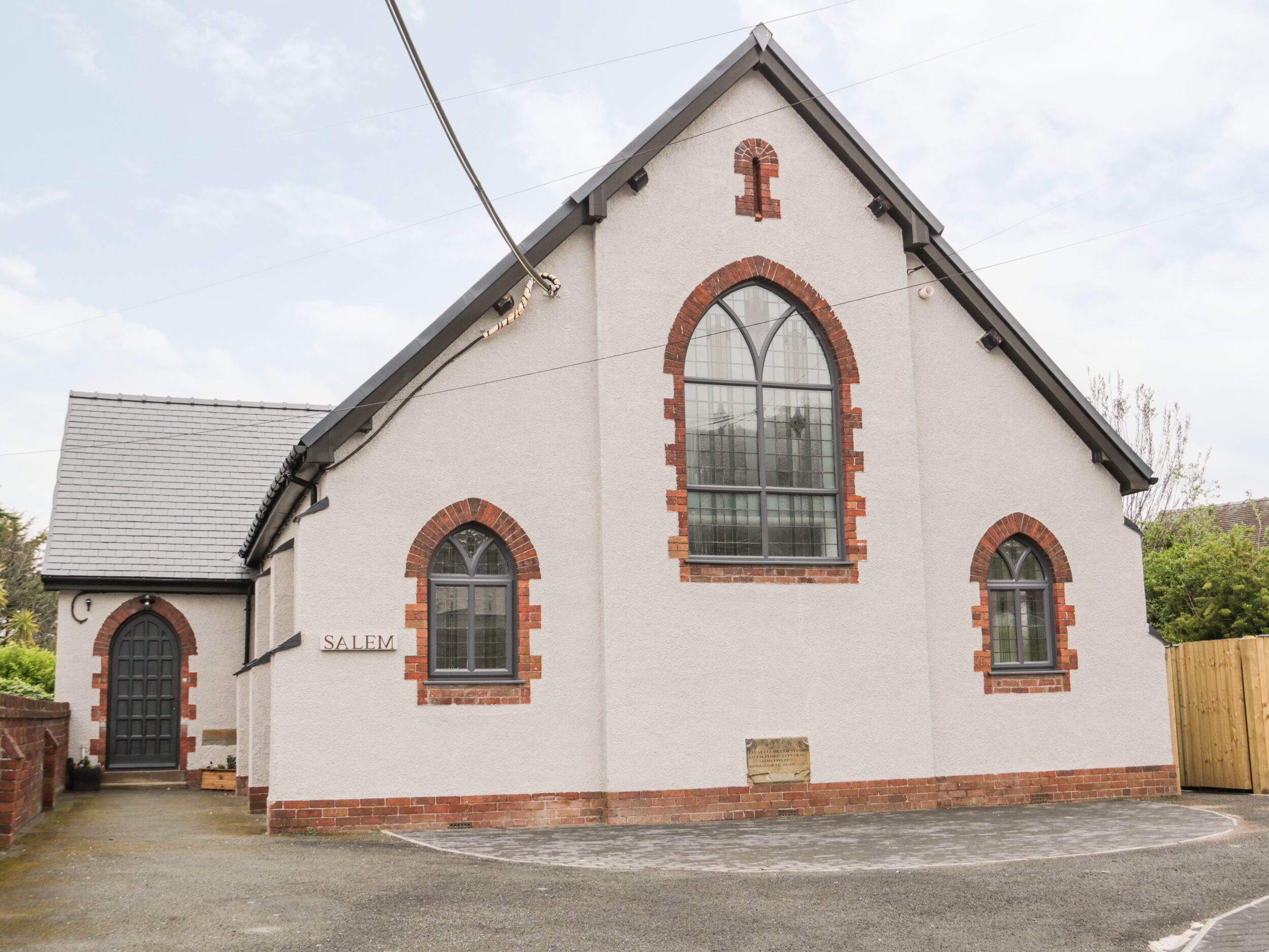 Salem in Meliden in Denbighshire. Six-bedroom, converted chapel with hot tub and games room. Stylish