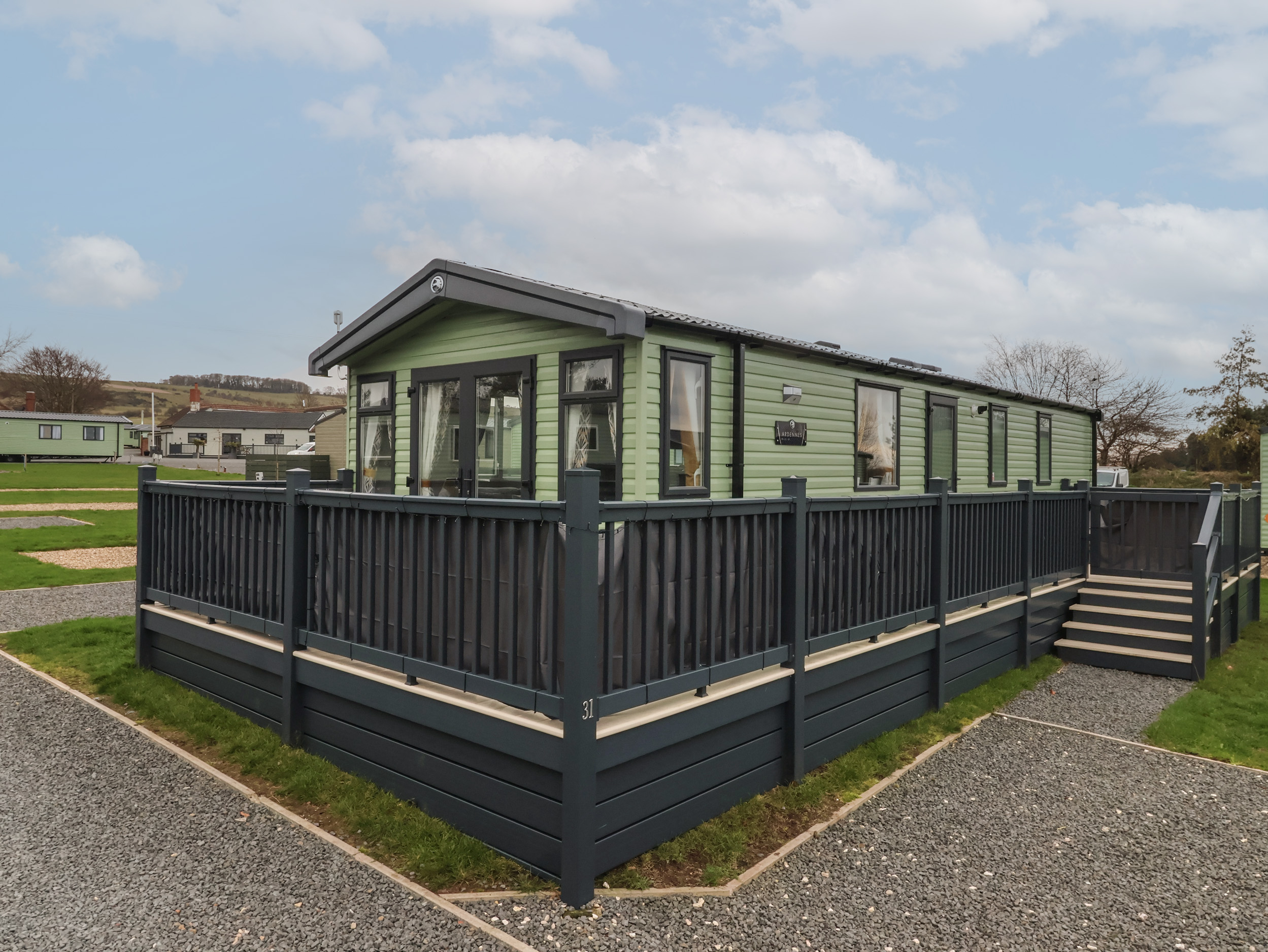 Lot 31 is located near Malton, North Yorkshire. Two-bedroom lodge with hot tub. Pet-friendly. Family