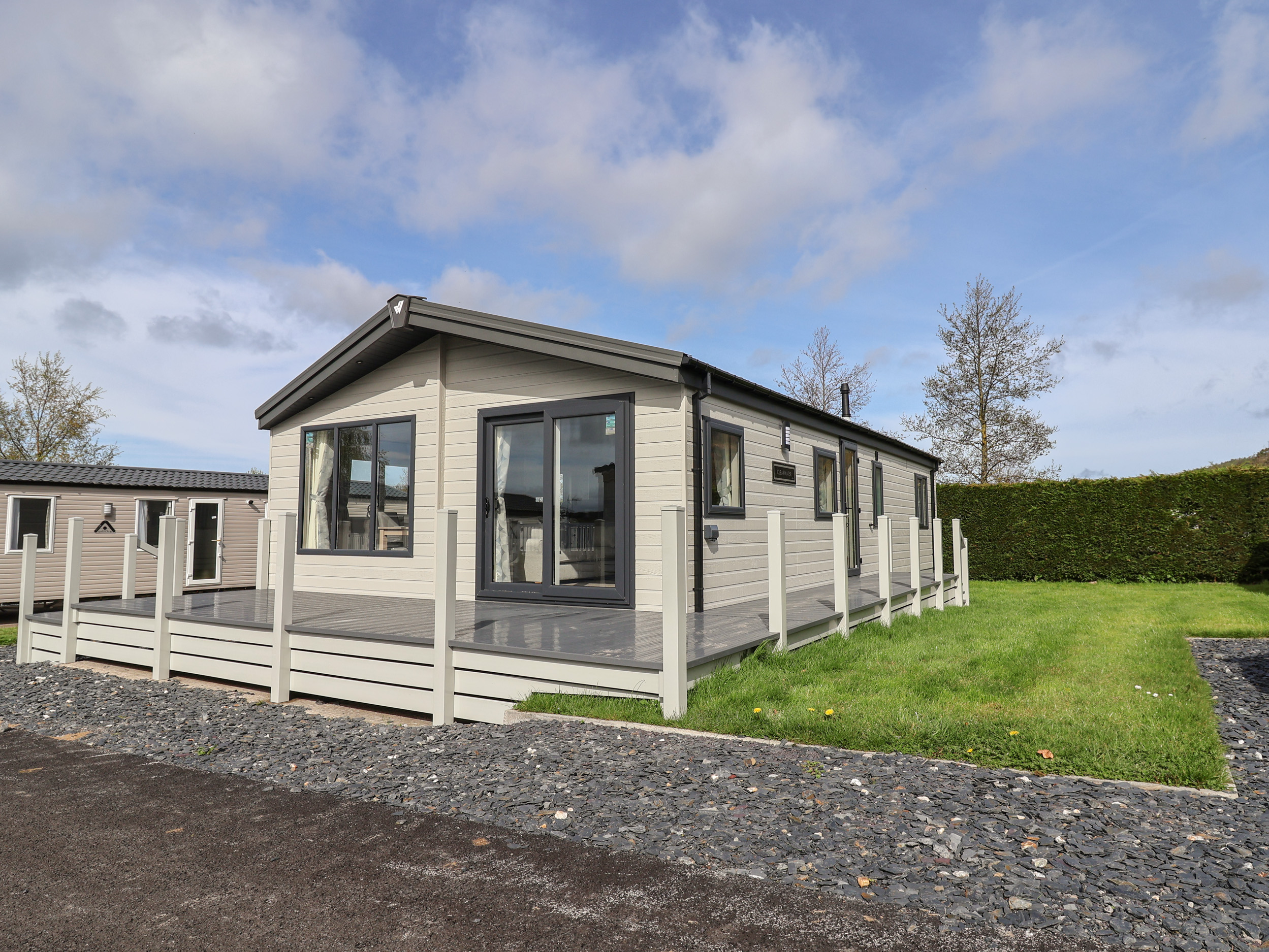 Lodge 3 in St Asaph, Denbighshire, North Wales. Single-storey. Smart TV. Decking. On-site facilities