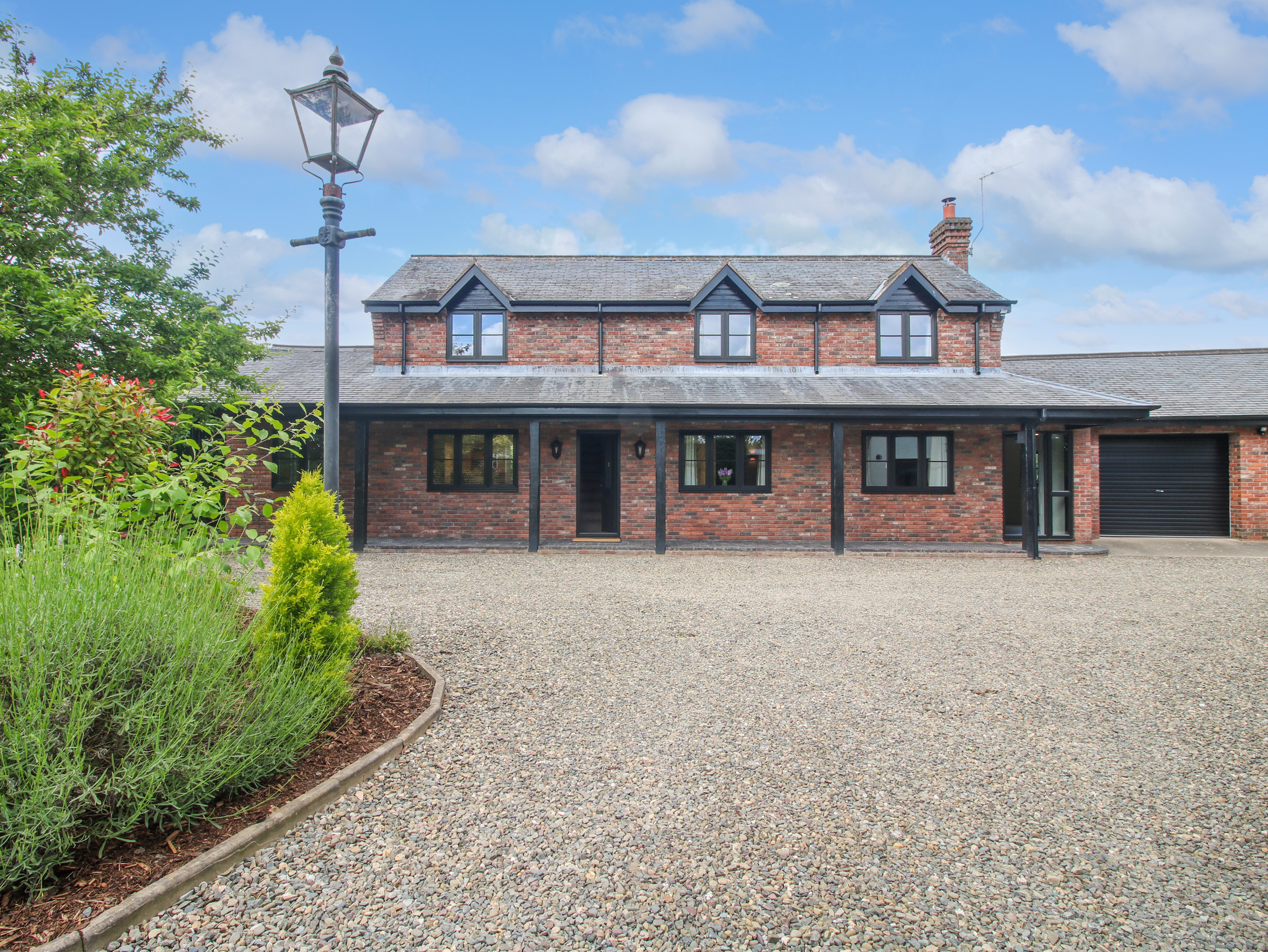 1 Clarkes Lane in St Martins, Shropshire. Woodburning stove. Games room. Hot tub. Pet-friendly. WiFi